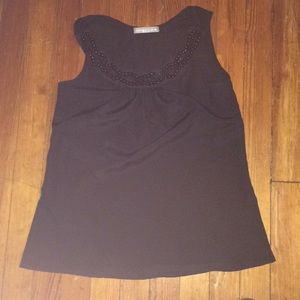 Black sleeveless blouse with beaded neckline